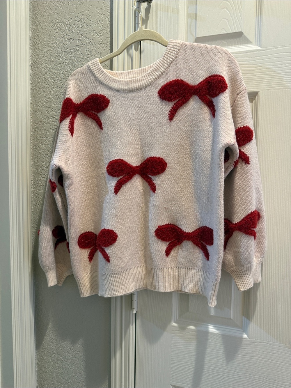 Judith March Cream Sweater with Red Bow Accents